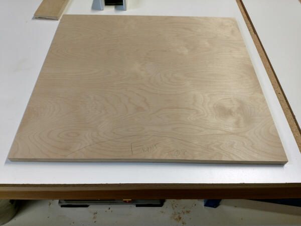 plywood cut to rectangle dimensions of shelf