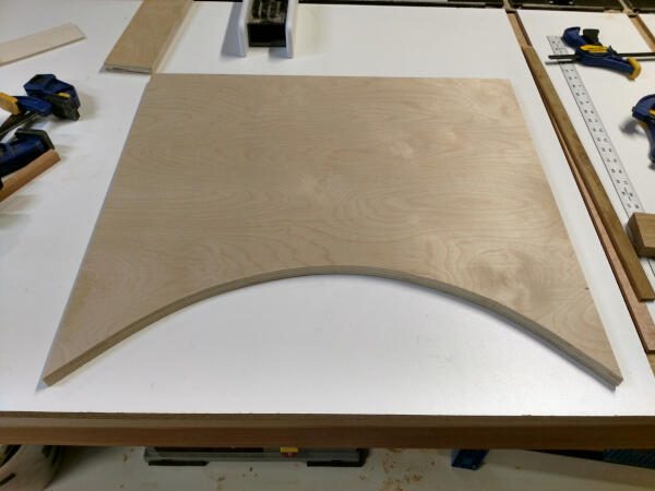 curve cut in cabinet shelf